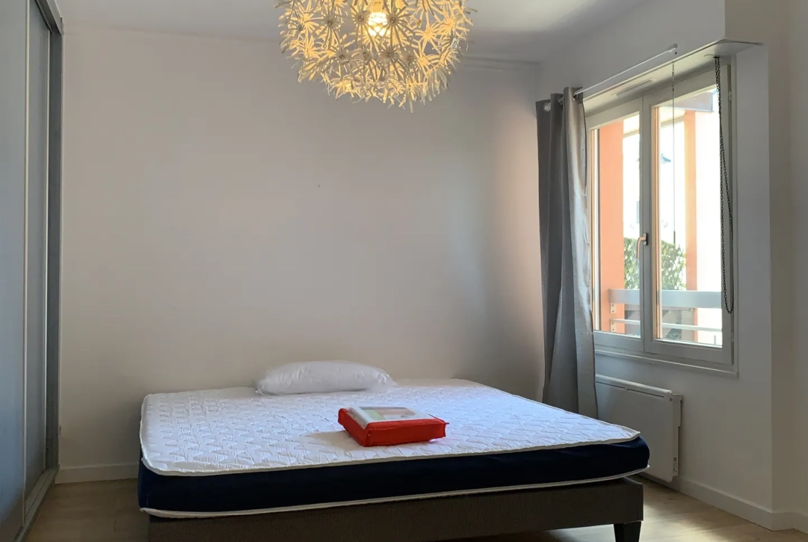 Appartement 3 pièces de 65 m² à Colmar avec balcon et garage en centre-ville 