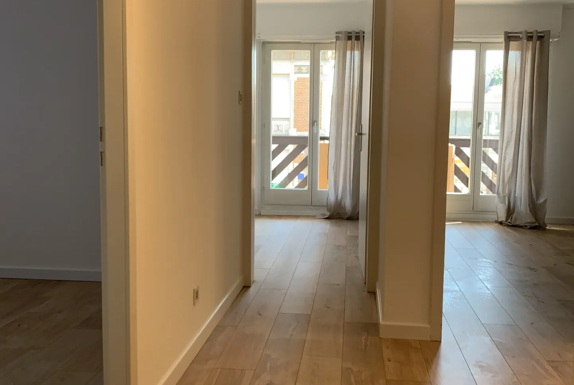 Appartement 3 pièces de 65 m² à Colmar avec balcon et garage en centre-ville 