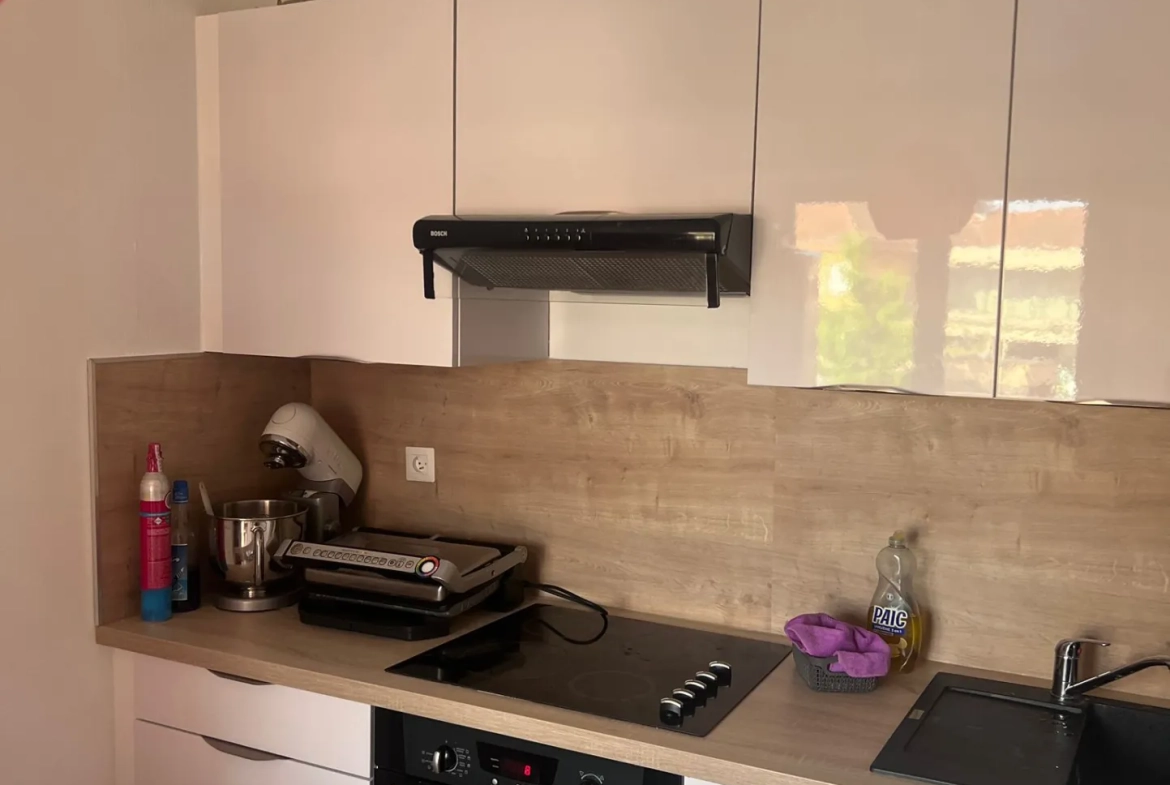 Appartement 3 pièces de 65 m² à Colmar avec balcon et garage en centre-ville 