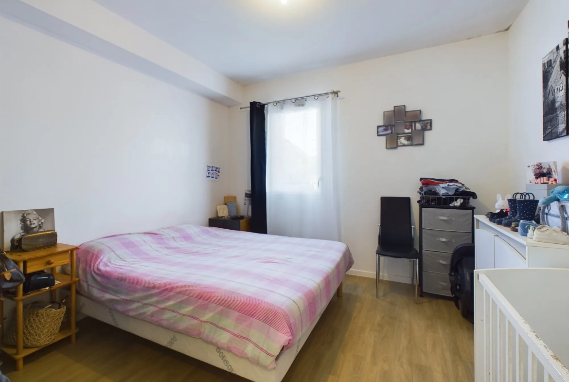 Vente d'un appartement 3 pièces avec jardin et parking à Saint-Pierre-du-Perray 