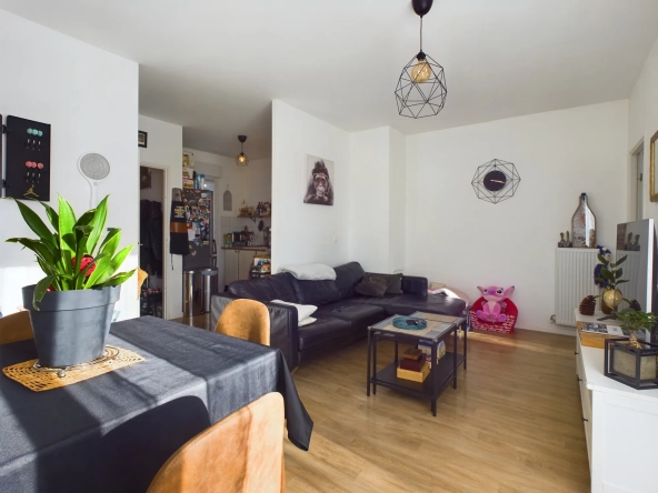 Vente d'un appartement 3 pièces avec jardin et parking à Saint-Pierre-du-Perray