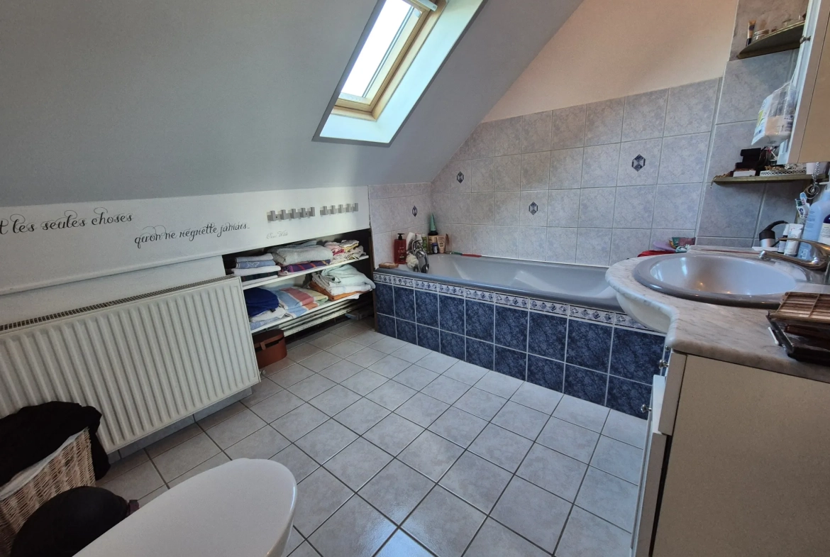 Maison 4 chambres à Harnes avec jardin et double garage 