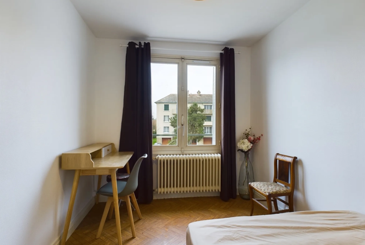 Appartement T4 lumineux à Nevers avec balcon et parking privé 