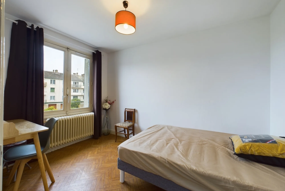 Appartement T4 lumineux à Nevers avec balcon et parking privé 