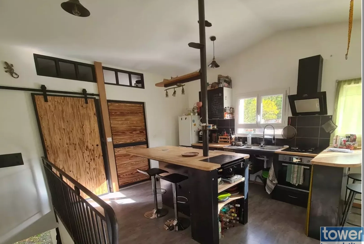 Vente ensemble immobilier avec atelier et maison à Saint Laurent d’Olt 