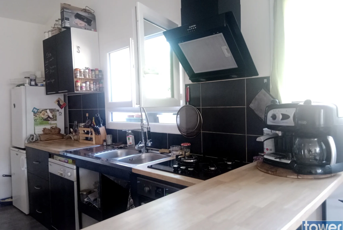 Vente ensemble immobilier avec atelier et maison à Saint Laurent d’Olt 