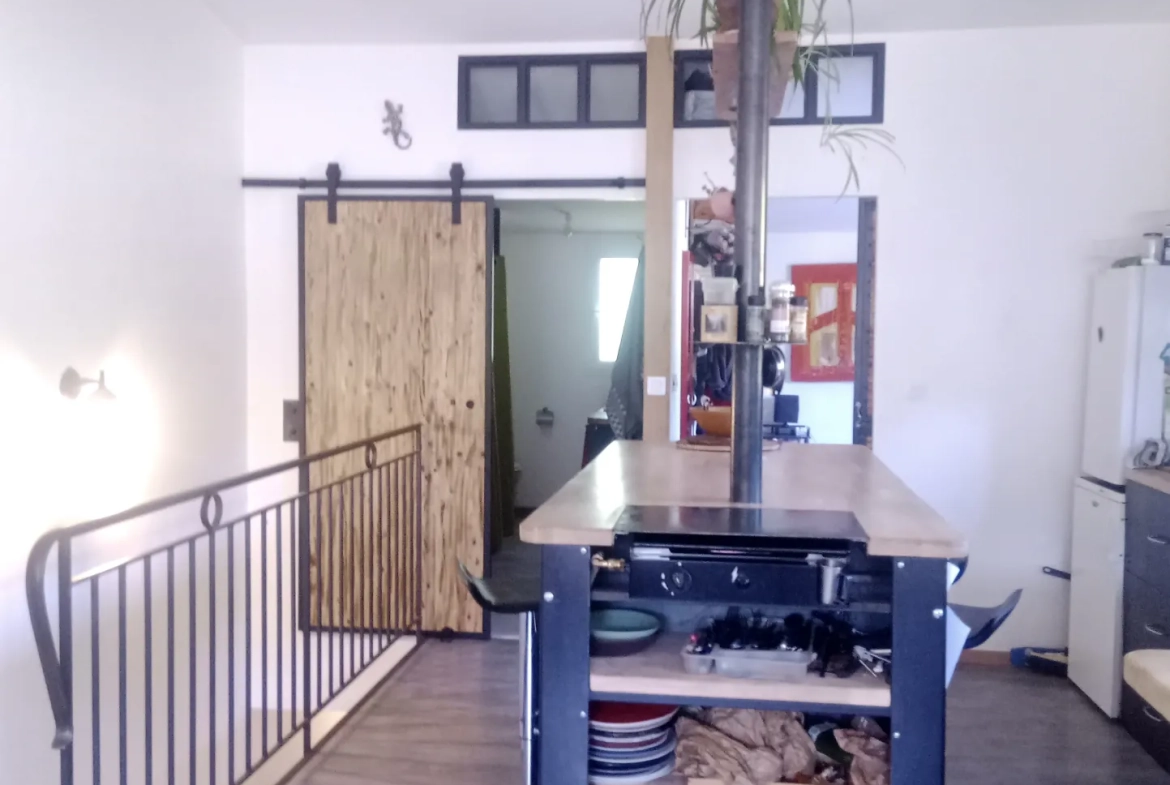 Vente ensemble immobilier avec atelier et maison à Saint Laurent d’Olt 