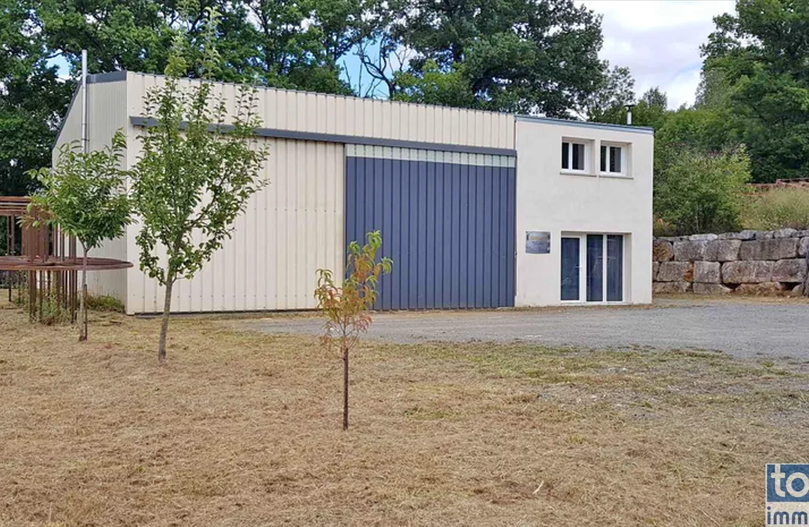 Vente ensemble immobilier avec atelier et maison à Saint Laurent d’Olt 