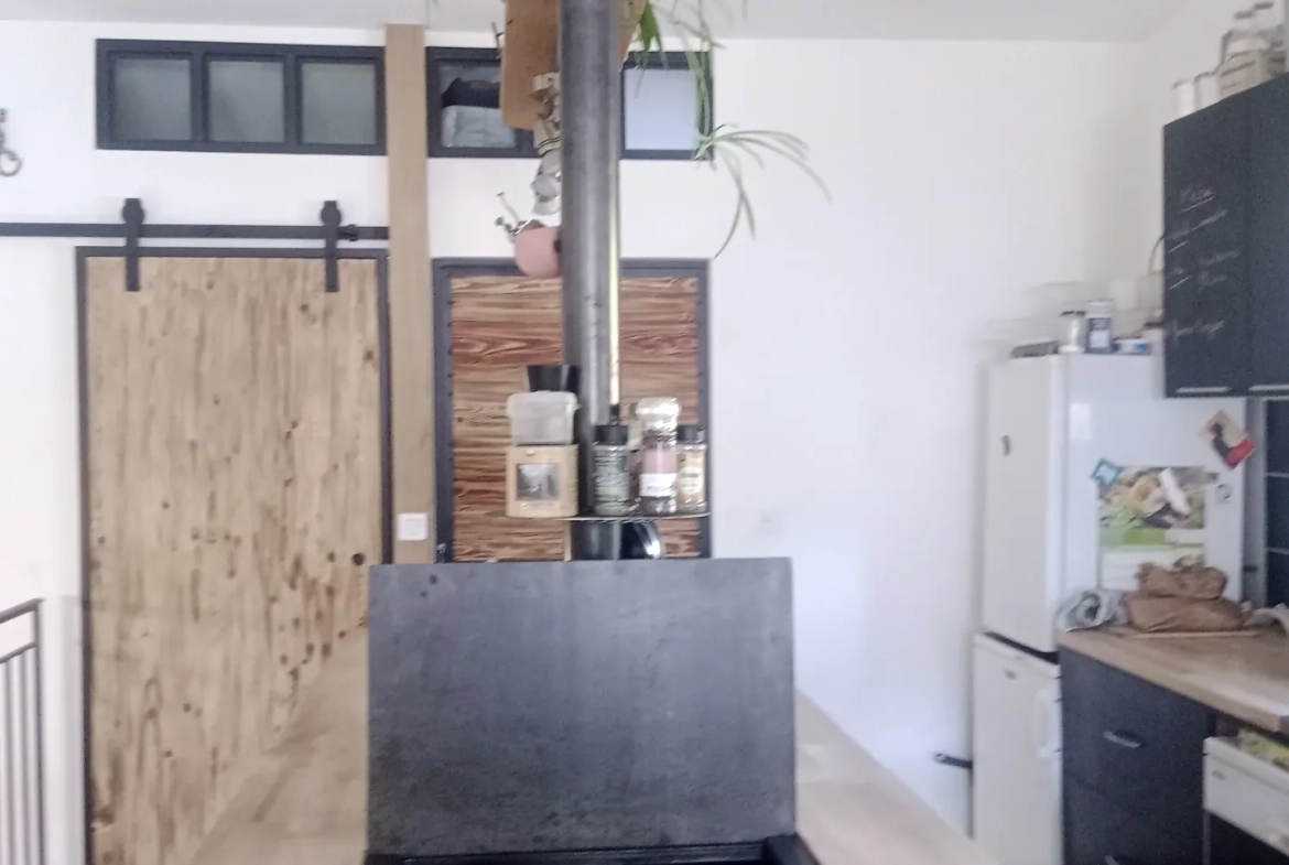 Vente ensemble immobilier avec atelier et maison à Saint Laurent d’Olt 