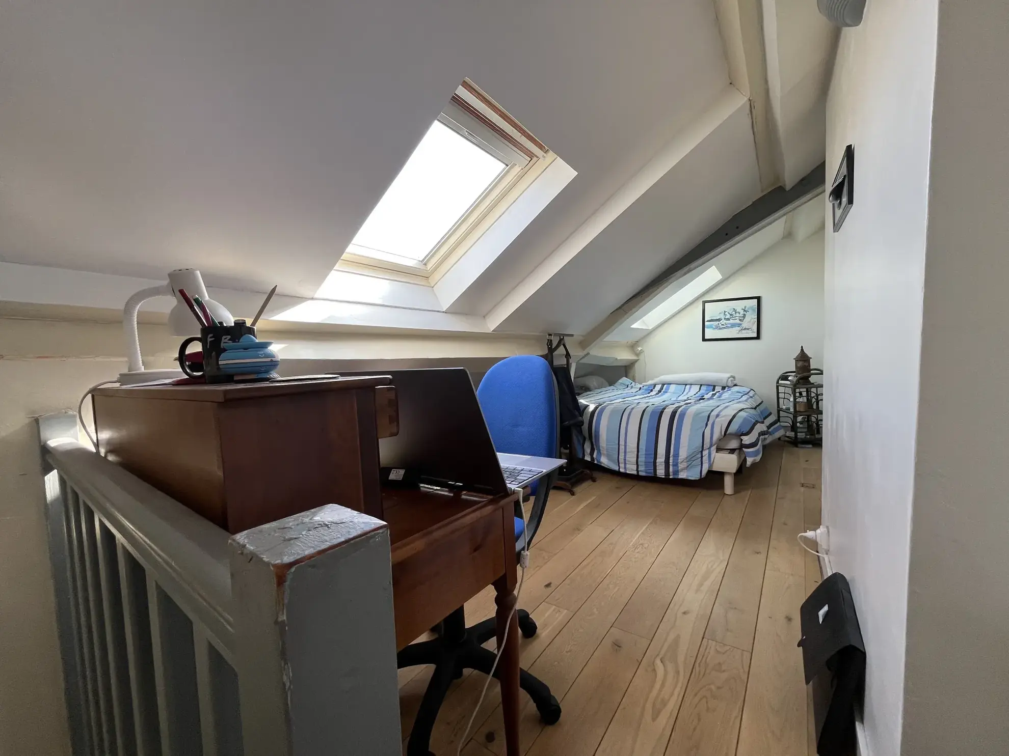 Appartement duplex T2 à Saint Germain avec vue sur les toits, secteur calme 
