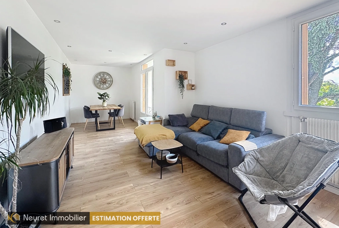 Appartement T3 rénové à Pierre-Bénite avec balcon et cave, secteur calme à proximité des commodités 