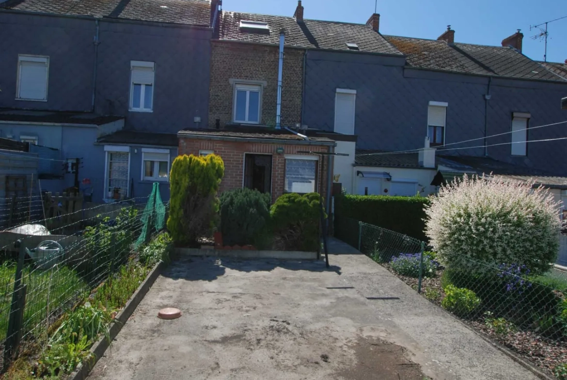 Maison à vendre à Marpent avec jardin, garage et 3 chambres 