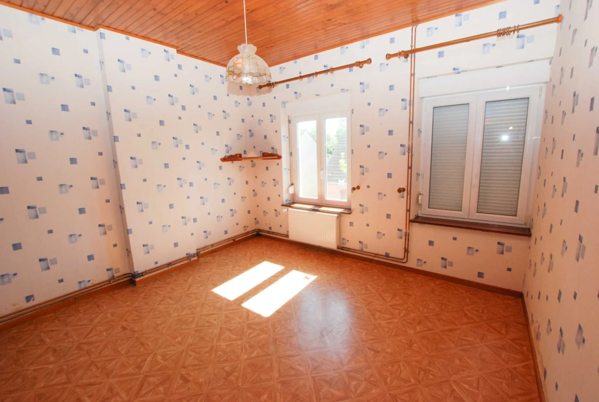 Maison à vendre à Marpent avec jardin, garage et 3 chambres 