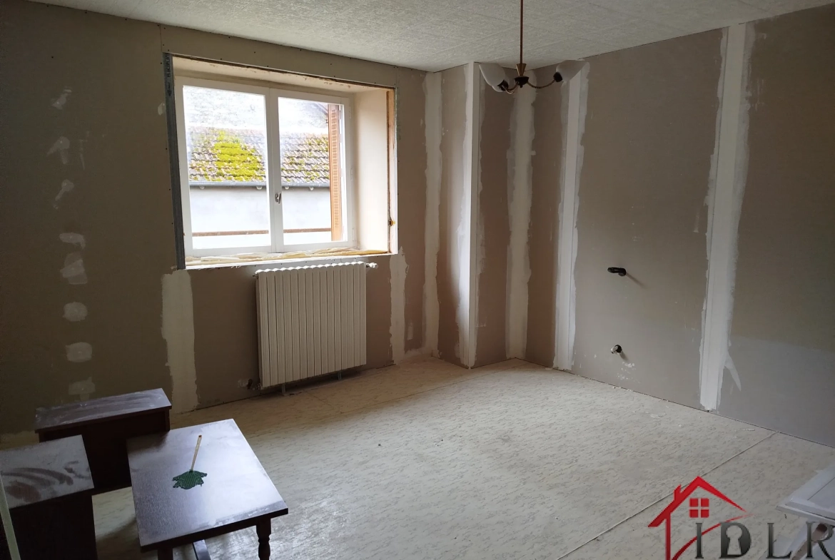Maison en pierre à Bourdons-sur-Rognon (52700) avec garage et terrain 
