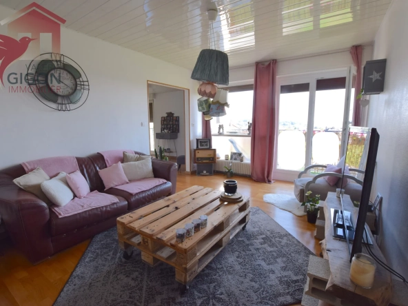 Appartement F5 lumineux avec grand balcon, garage et vue panoramique à Grand Charmont