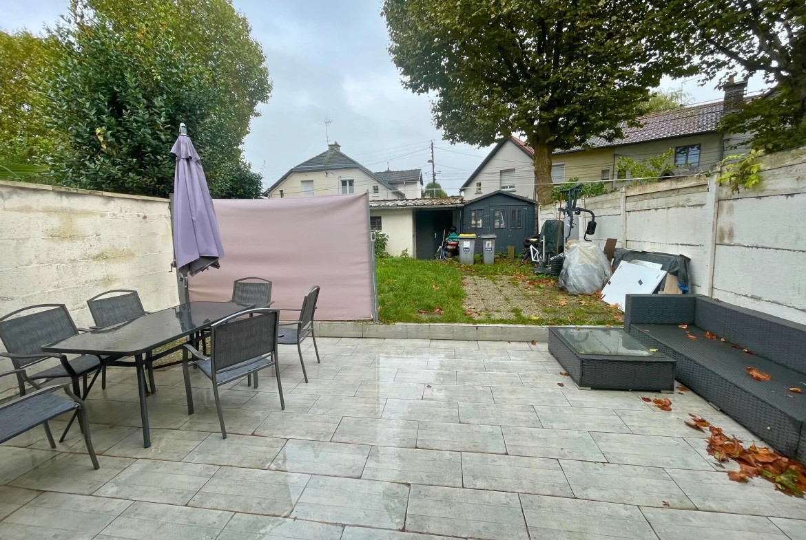 Maison 5 pièces à Roubaix avec jardin, garage et terrasse – secteur recherché 