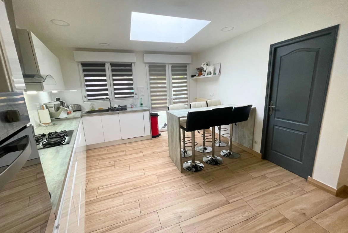Maison 5 pièces à Roubaix avec jardin, garage et terrasse – secteur recherché 