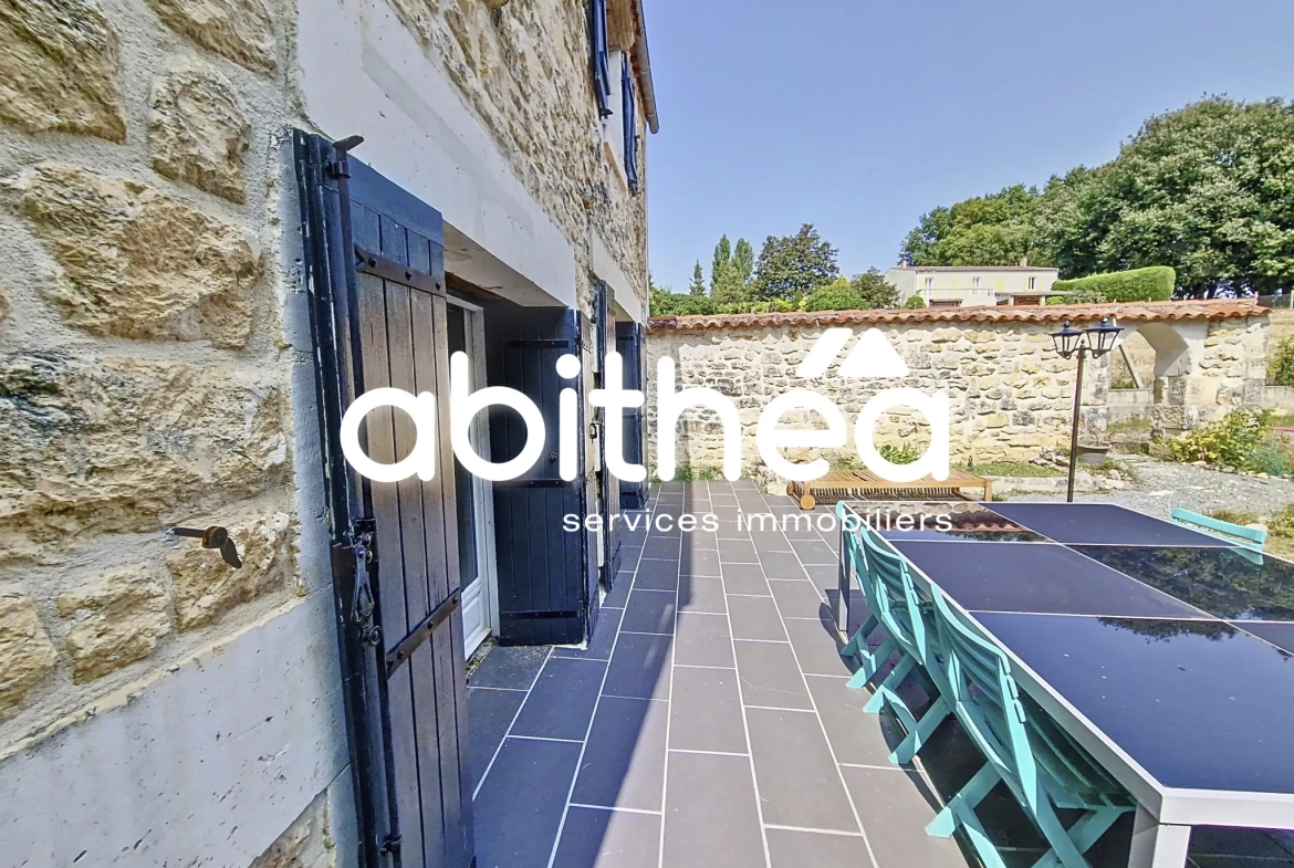 Charentaise rénovée de 117 m² avec 3 chambres, jardin et garage à Annepont 
