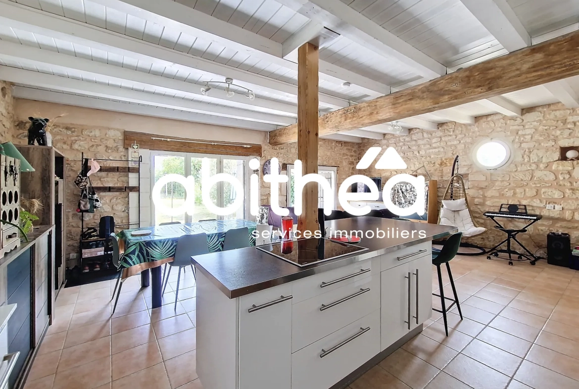 Charentaise rénovée de 117 m² avec 3 chambres, jardin et garage à Annepont 