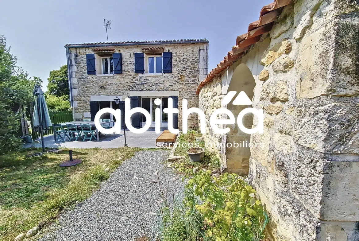 Charentaise rénovée de 117 m² avec 3 chambres, jardin et garage à Annepont 