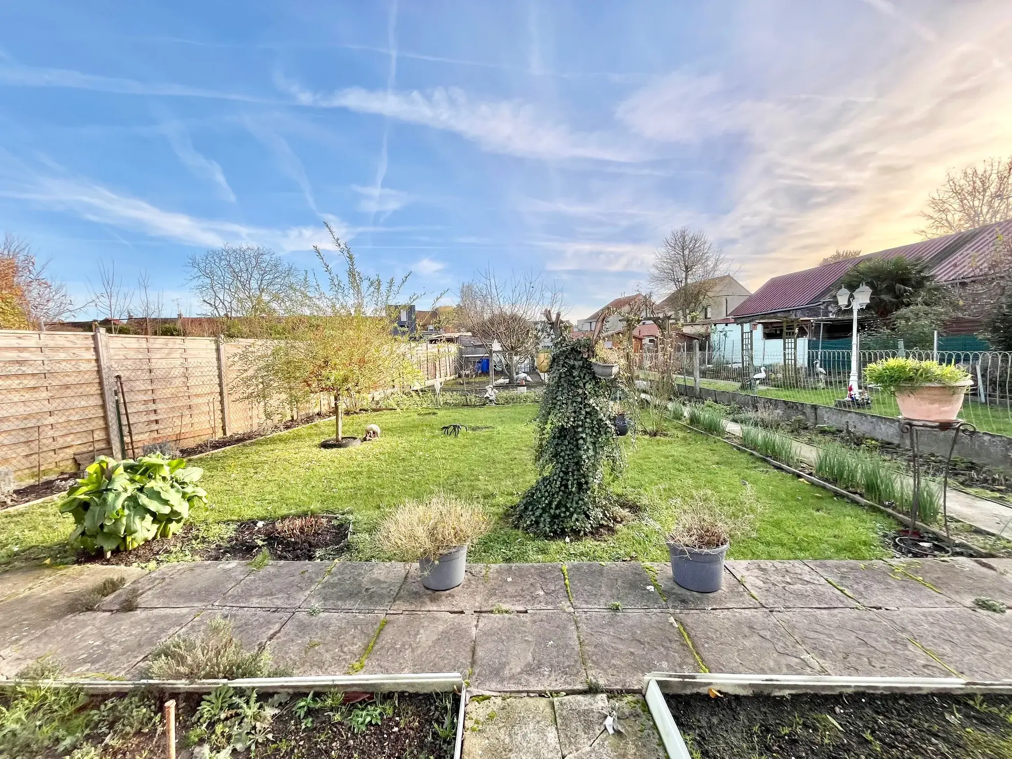 Charmante maison de 108 m² avec jardin et garage près de la frontière belge à Tourcoing 