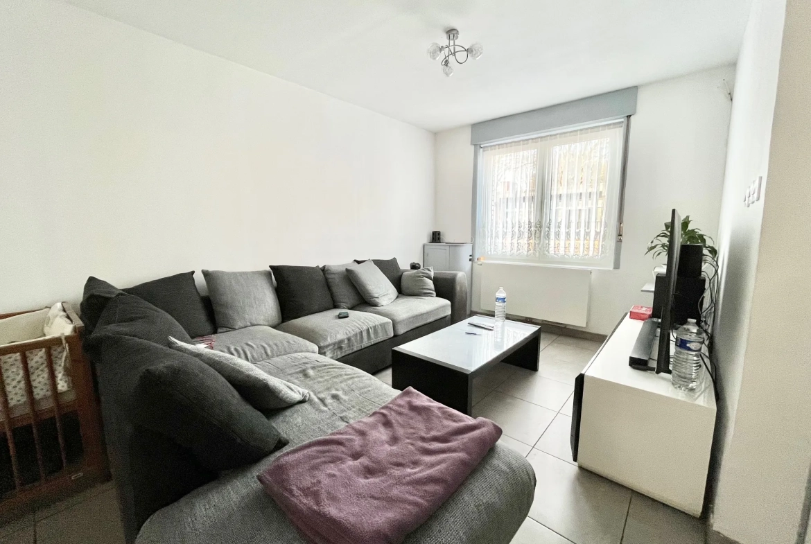 Charmante maison de 108 m² avec jardin et garage près de la frontière belge à Tourcoing 