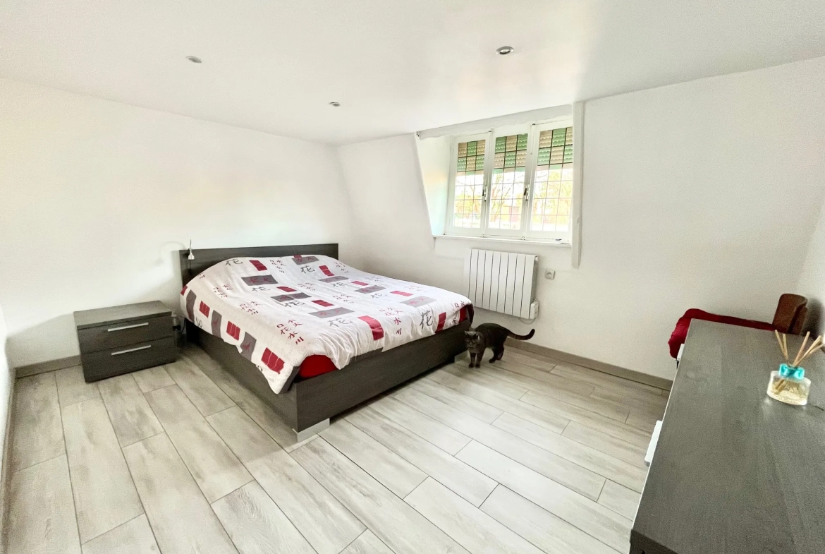 Charmante maison de 108 m² avec jardin et garage près de la frontière belge à Tourcoing 
