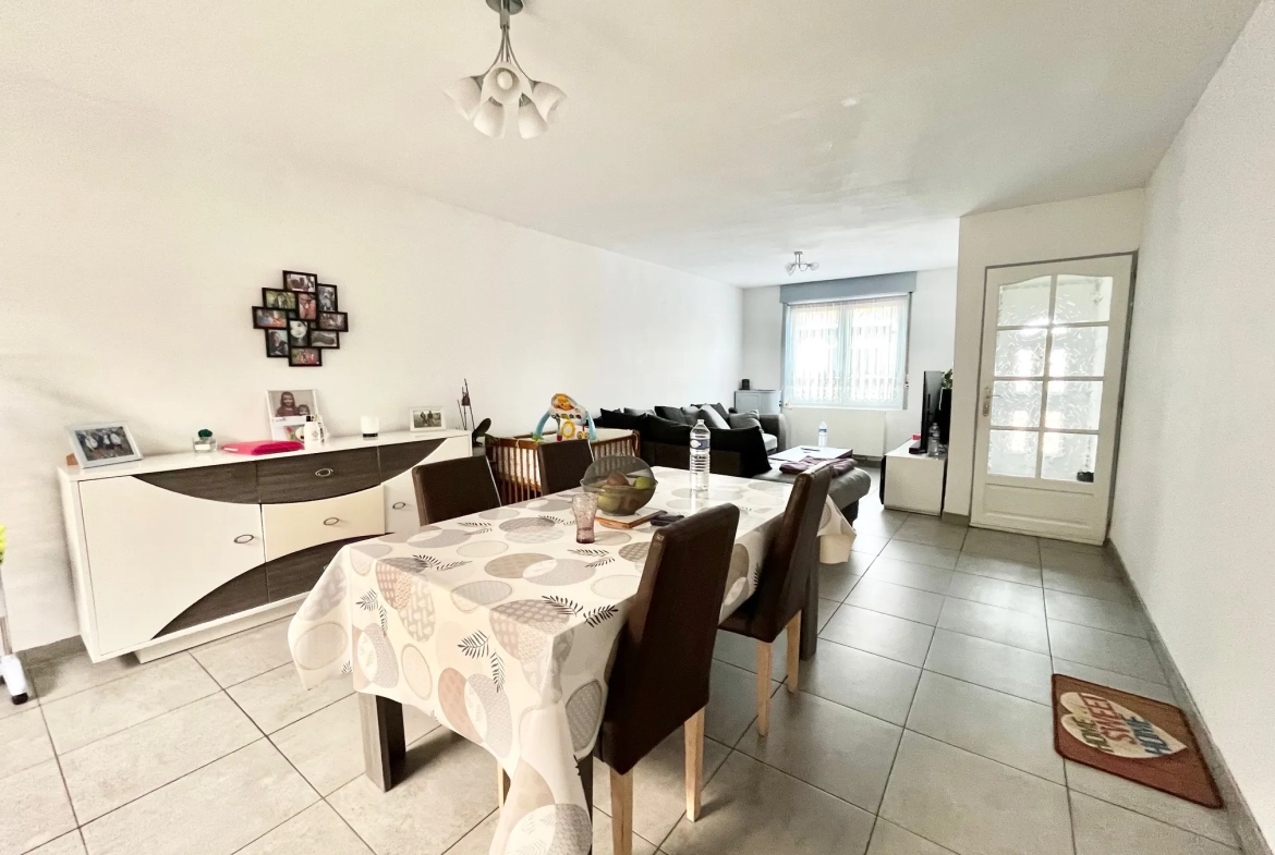 Charmante maison de 108 m² avec jardin et garage près de la frontière belge à Tourcoing 