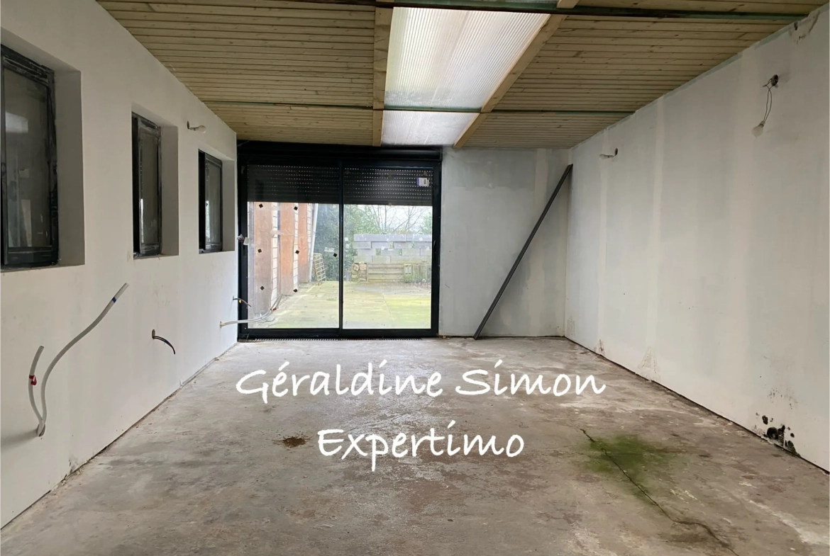 Maison à Lievin de 235 m² avec potentiel mixte et cour spacieuse 
