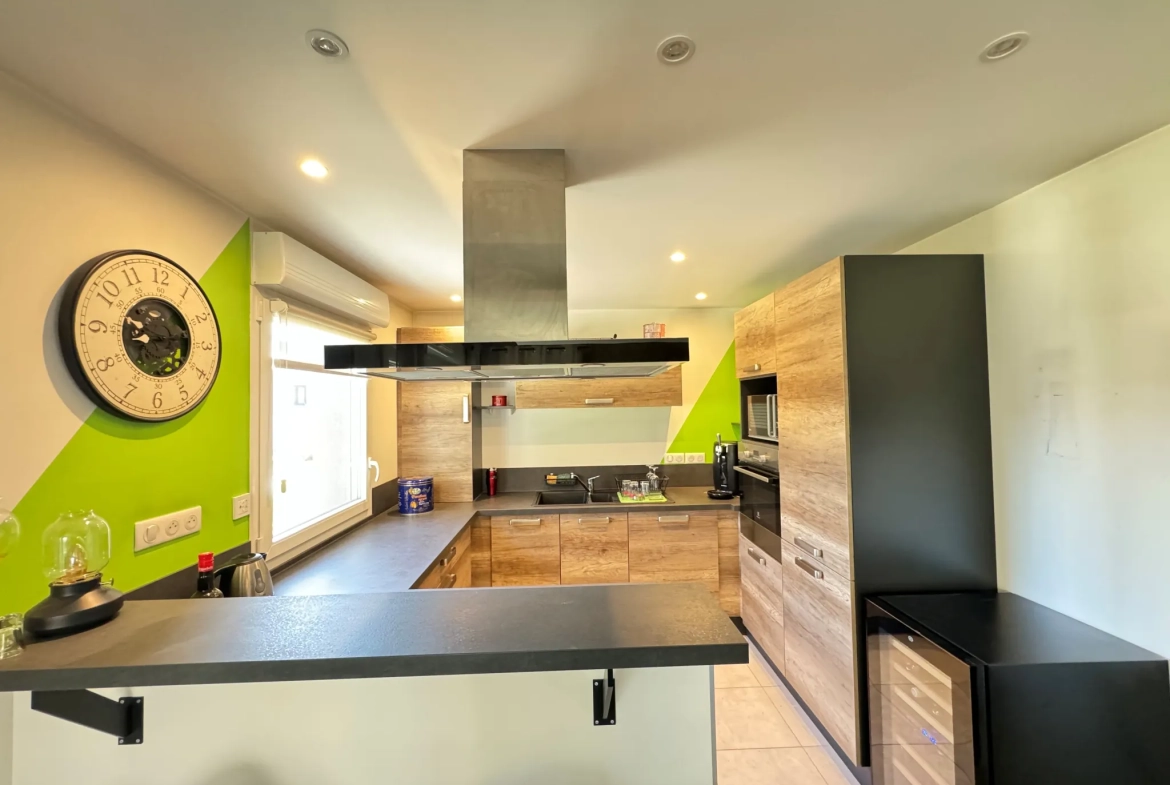 Magnifique duplex avec terrasse, jardin et garage double à Argiesans 