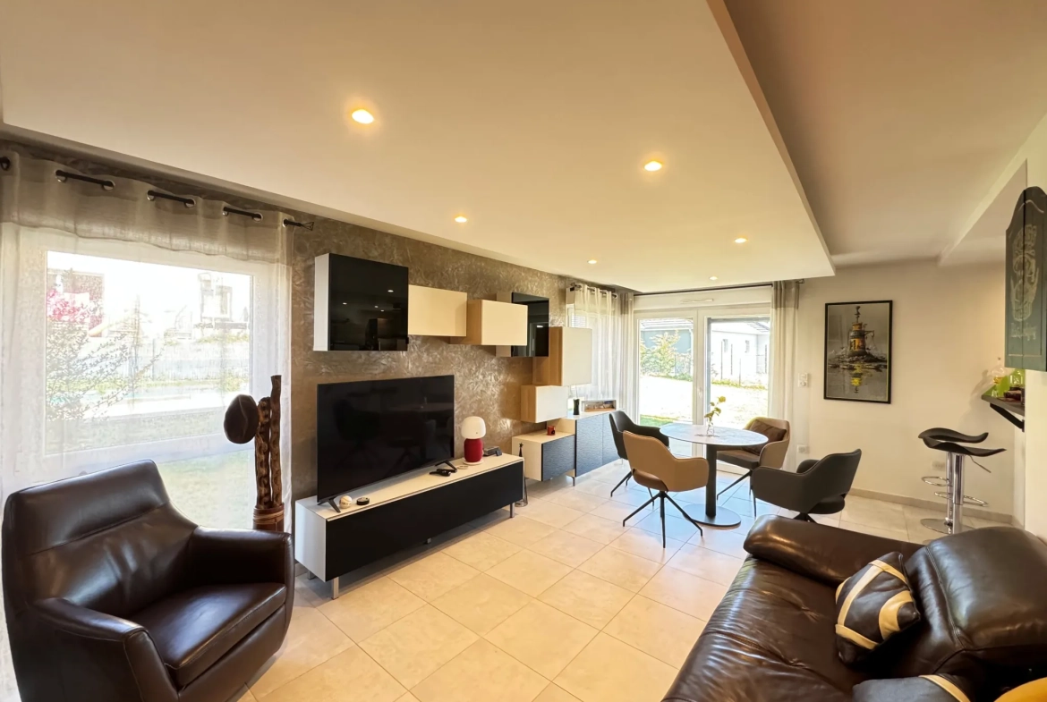 Magnifique duplex avec terrasse, jardin et garage double à Argiesans 