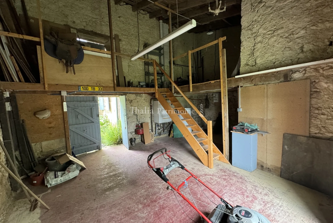Belle maison en pierre de 220m² avec atelier et jardin à Cadillac 