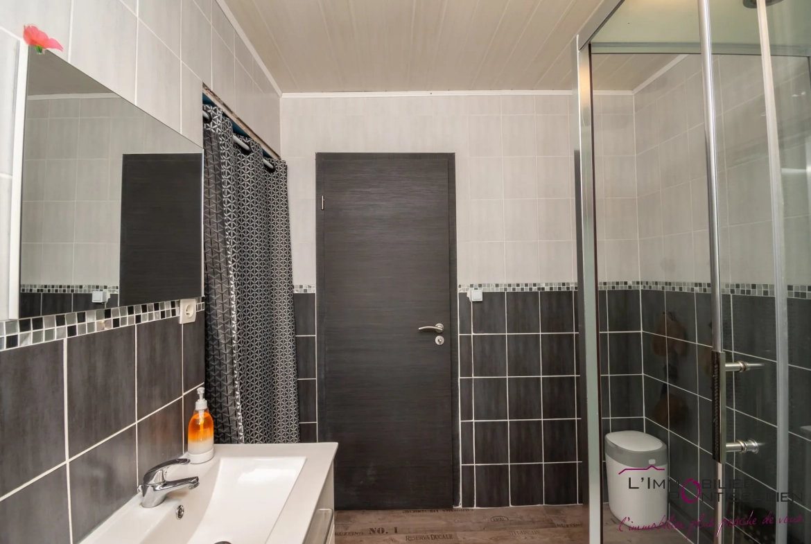 Appartement 5 pièces à Pontarlier avec jardin, garage et dépendances 