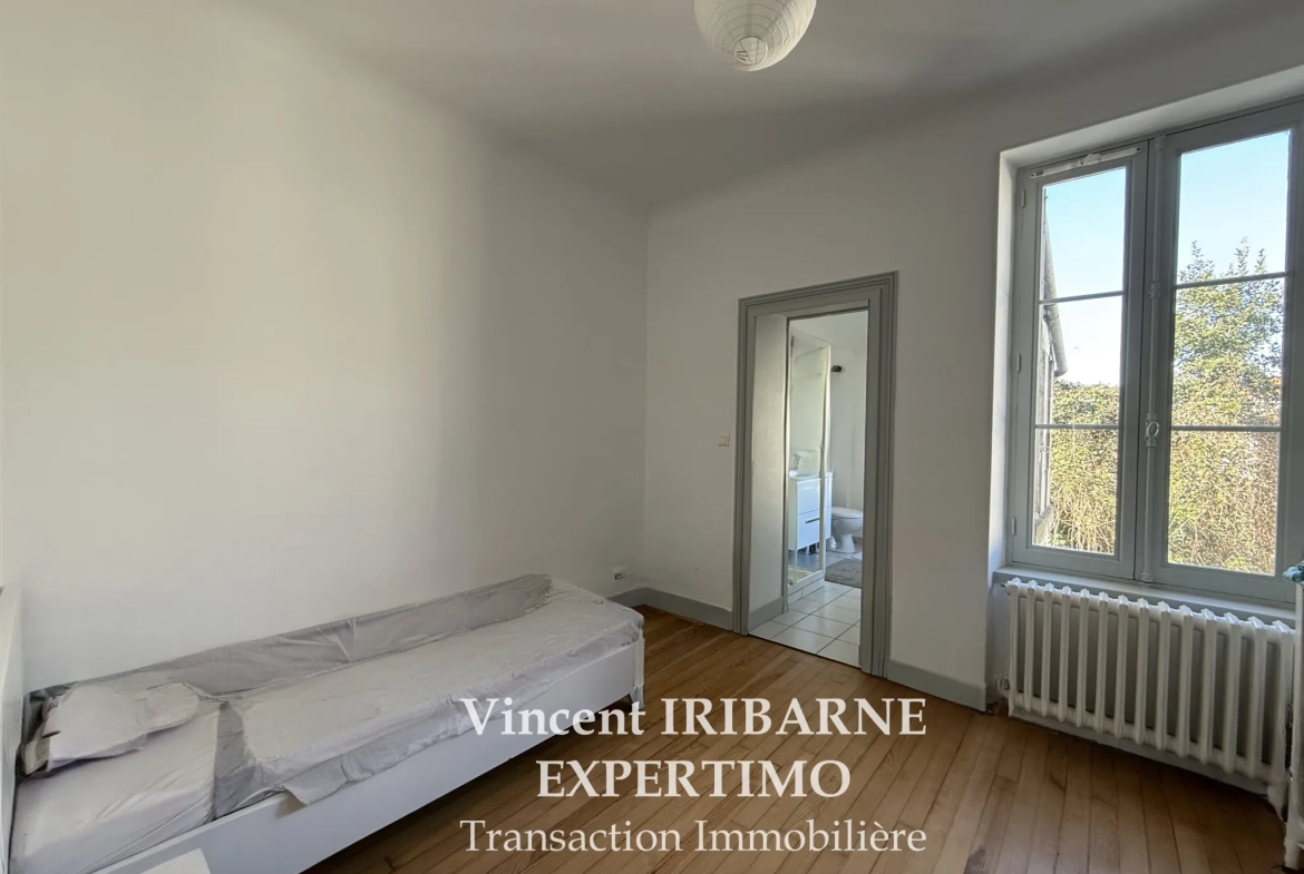 Maison de ville rénovée avec jardin à Saintes - 2 chambres 