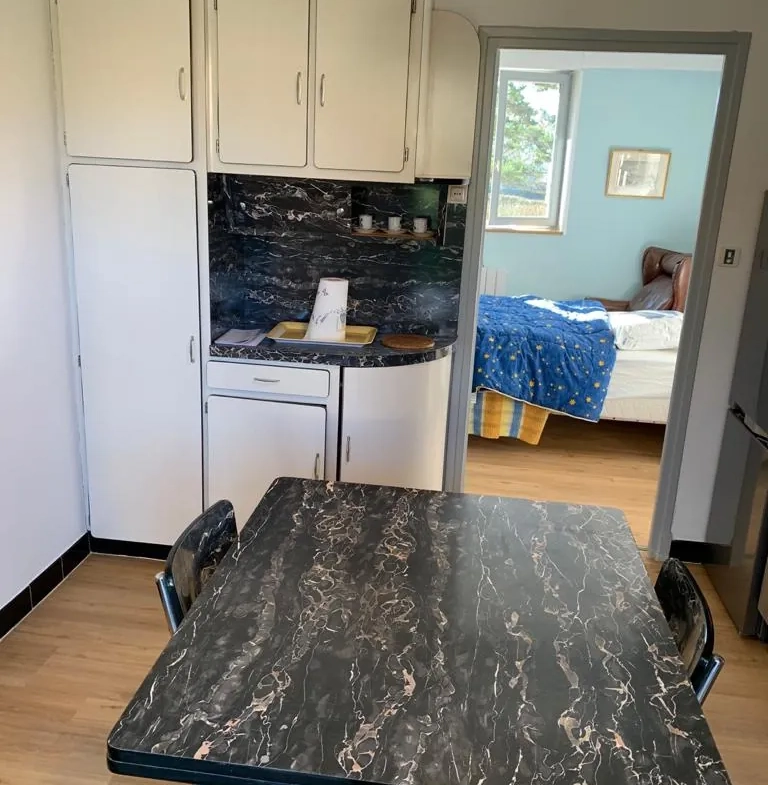 Maison 3 chambres avec T1 loué et terrain de 600 m² à Villefranche de Rouergue 