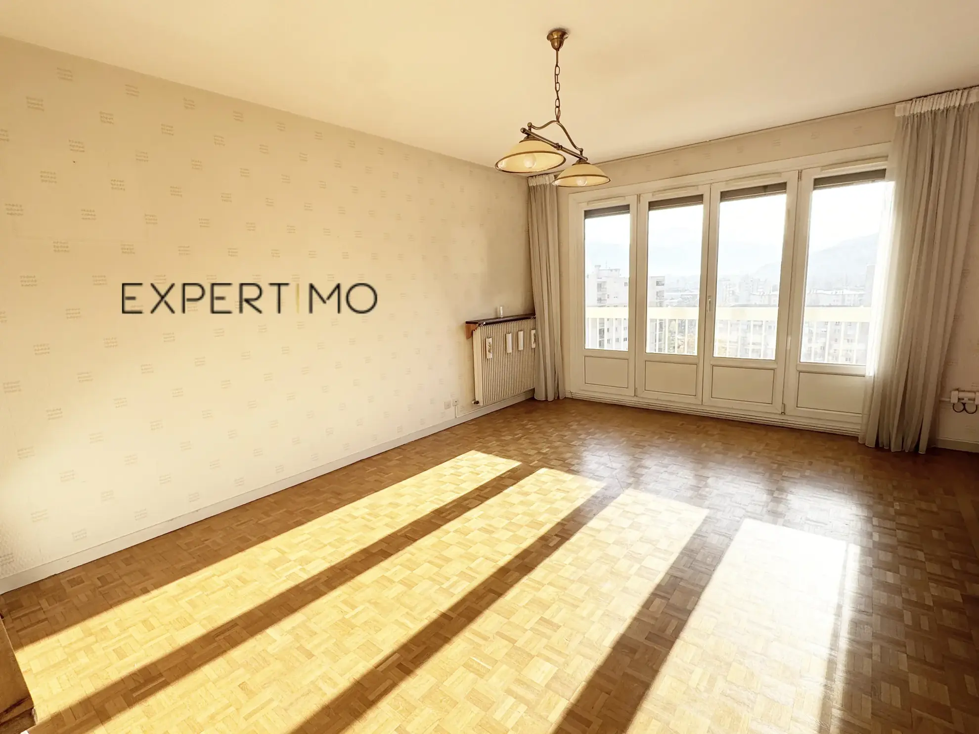 Appartement 4 pièces de 97m² à Sassenage avec balcon et cave 