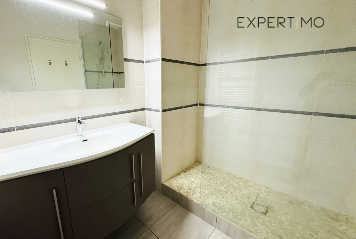 Appartement 4 pièces de 97m² à Sassenage avec balcon et cave 
