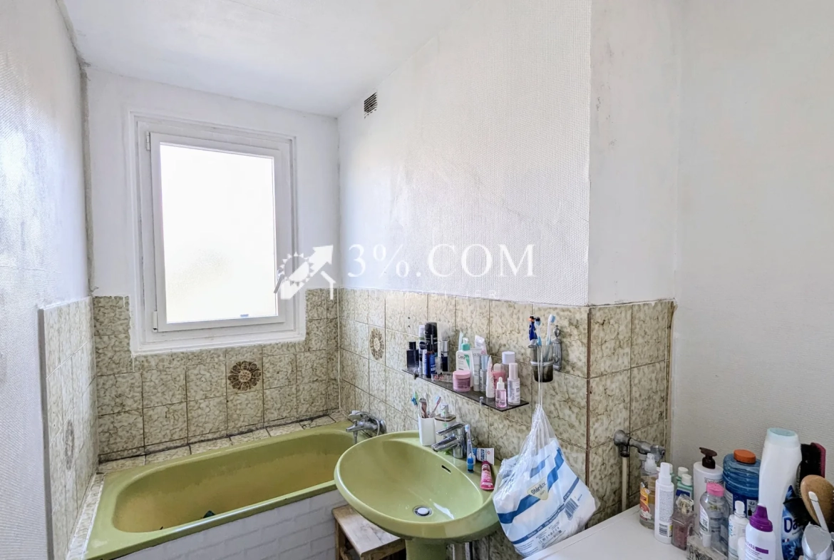 Appartement 4 pièces lumineux avec balcon, cave et parking à Poissy – Quartier Sablons 