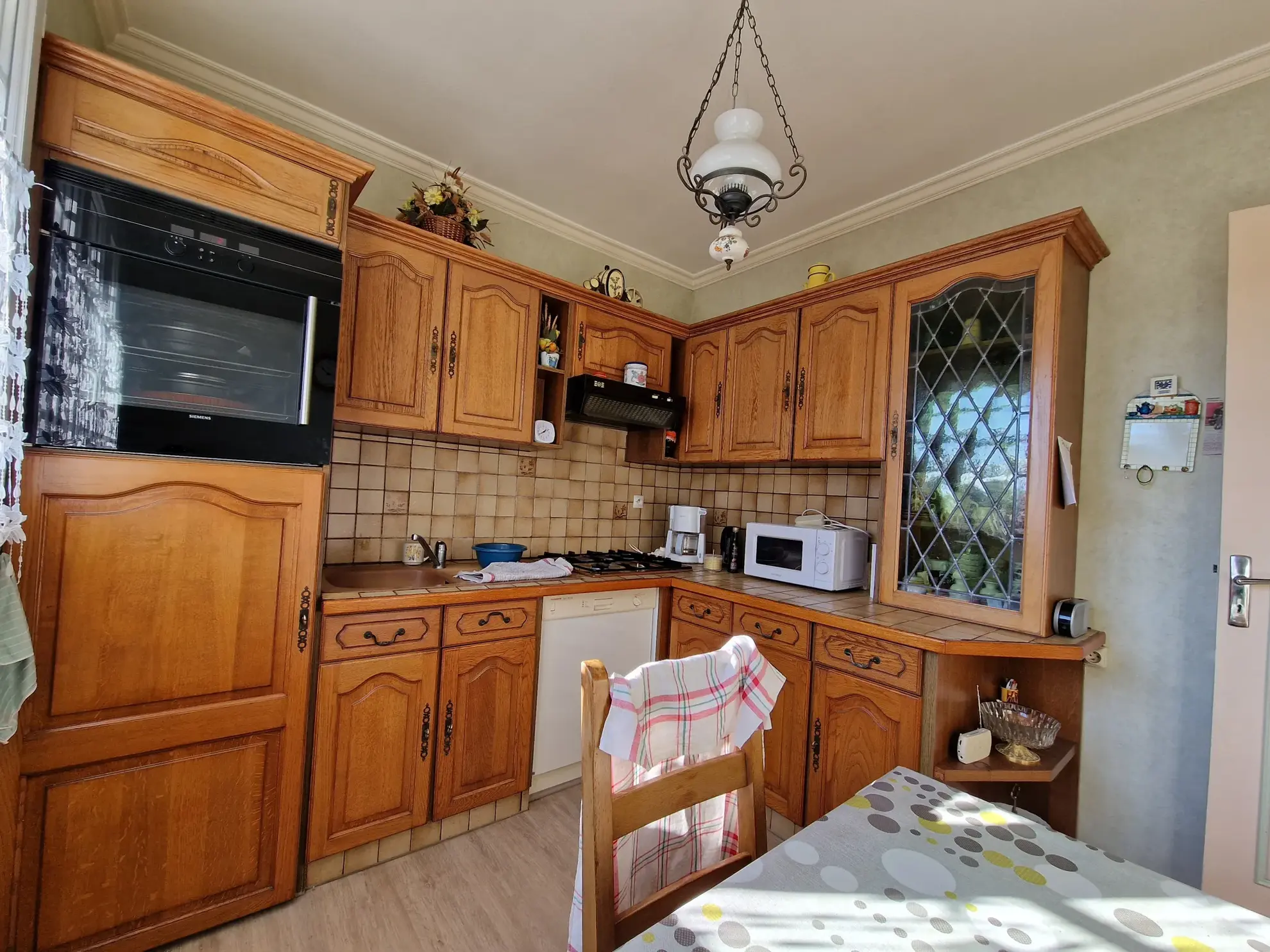 Maison à vendre à Saint-Nicolas-du-Pelem avec jardin, véranda et garage 