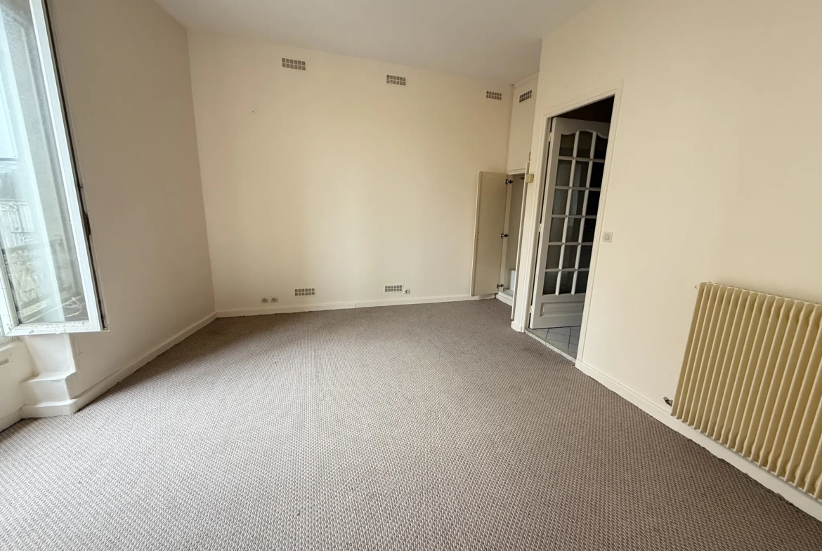 Appartement 3 pièces en centre-ville de Palaiseau avec jardin et cave 