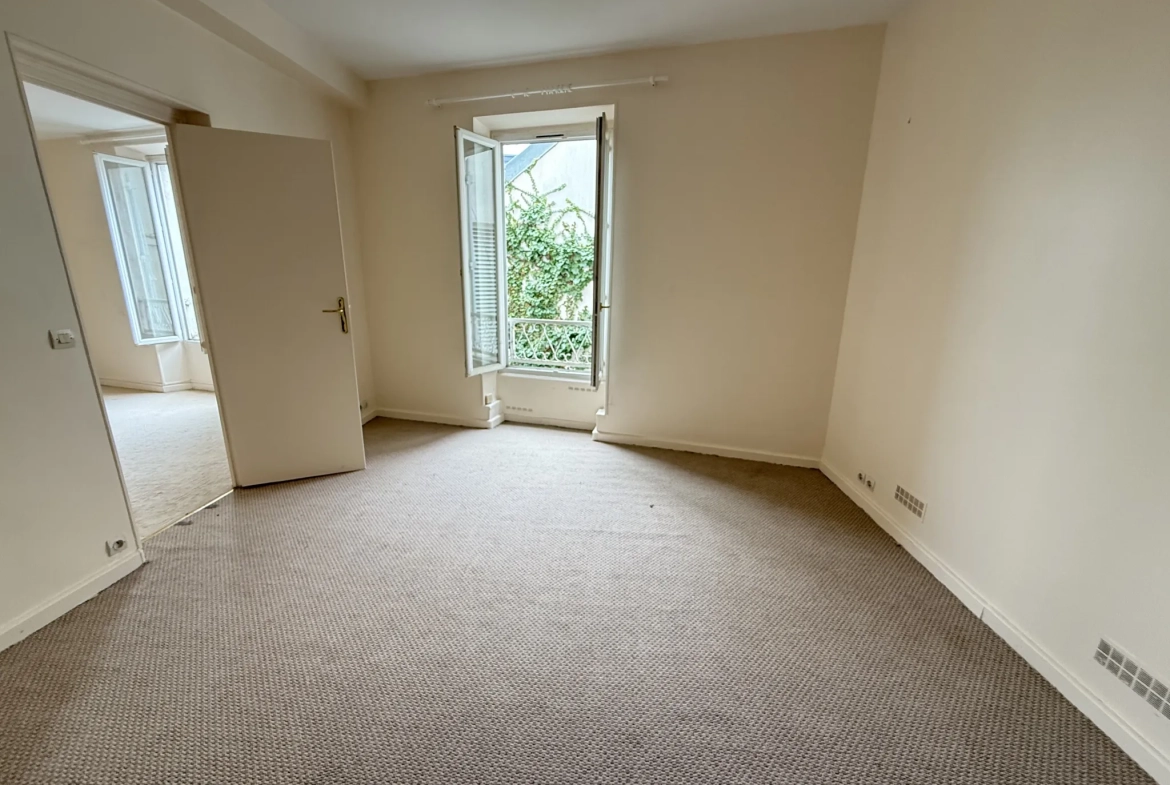 Appartement 3 pièces en centre-ville de Palaiseau avec jardin et cave 
