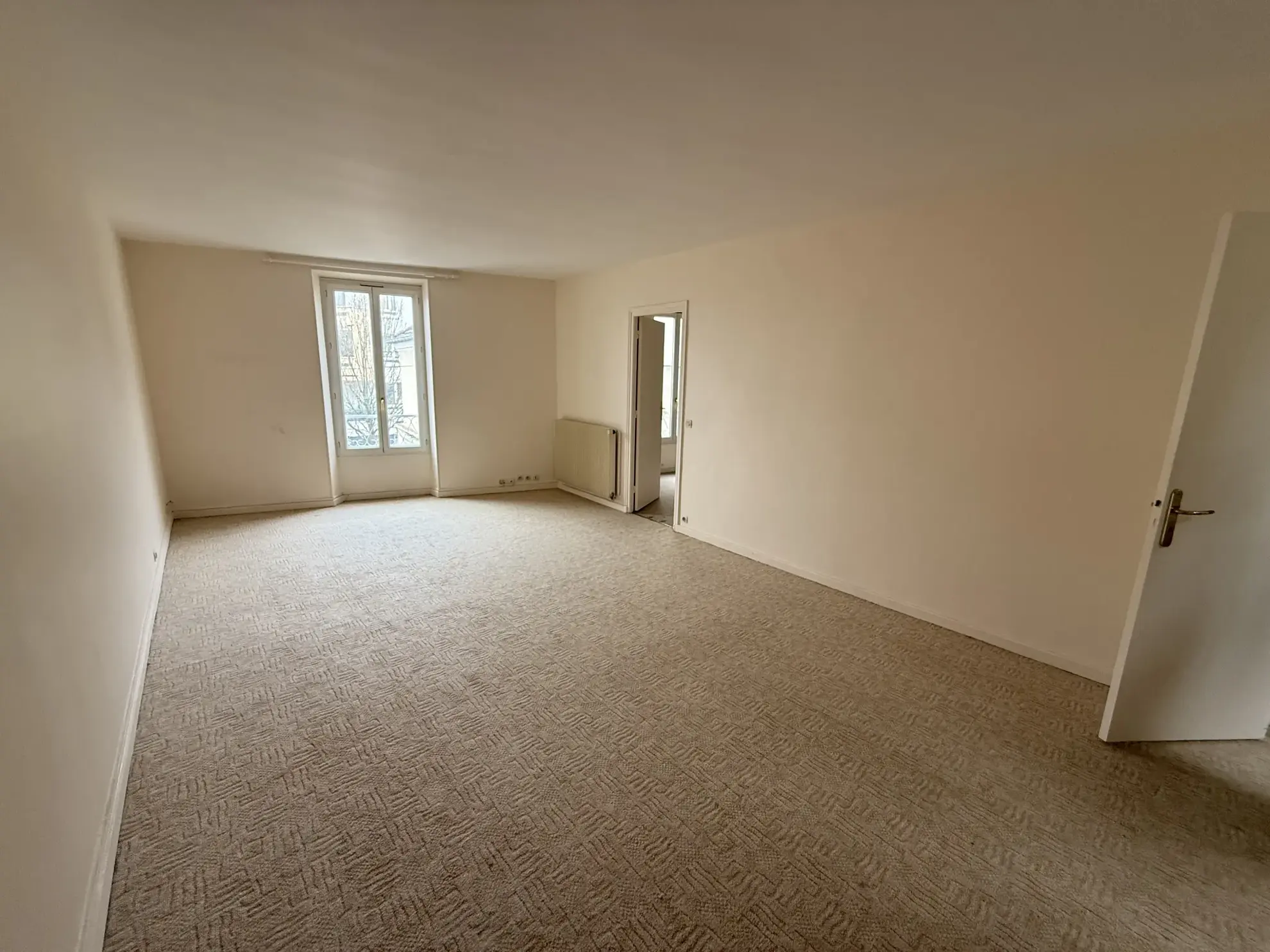 Appartement 3 pièces en centre-ville de Palaiseau avec jardin et cave 