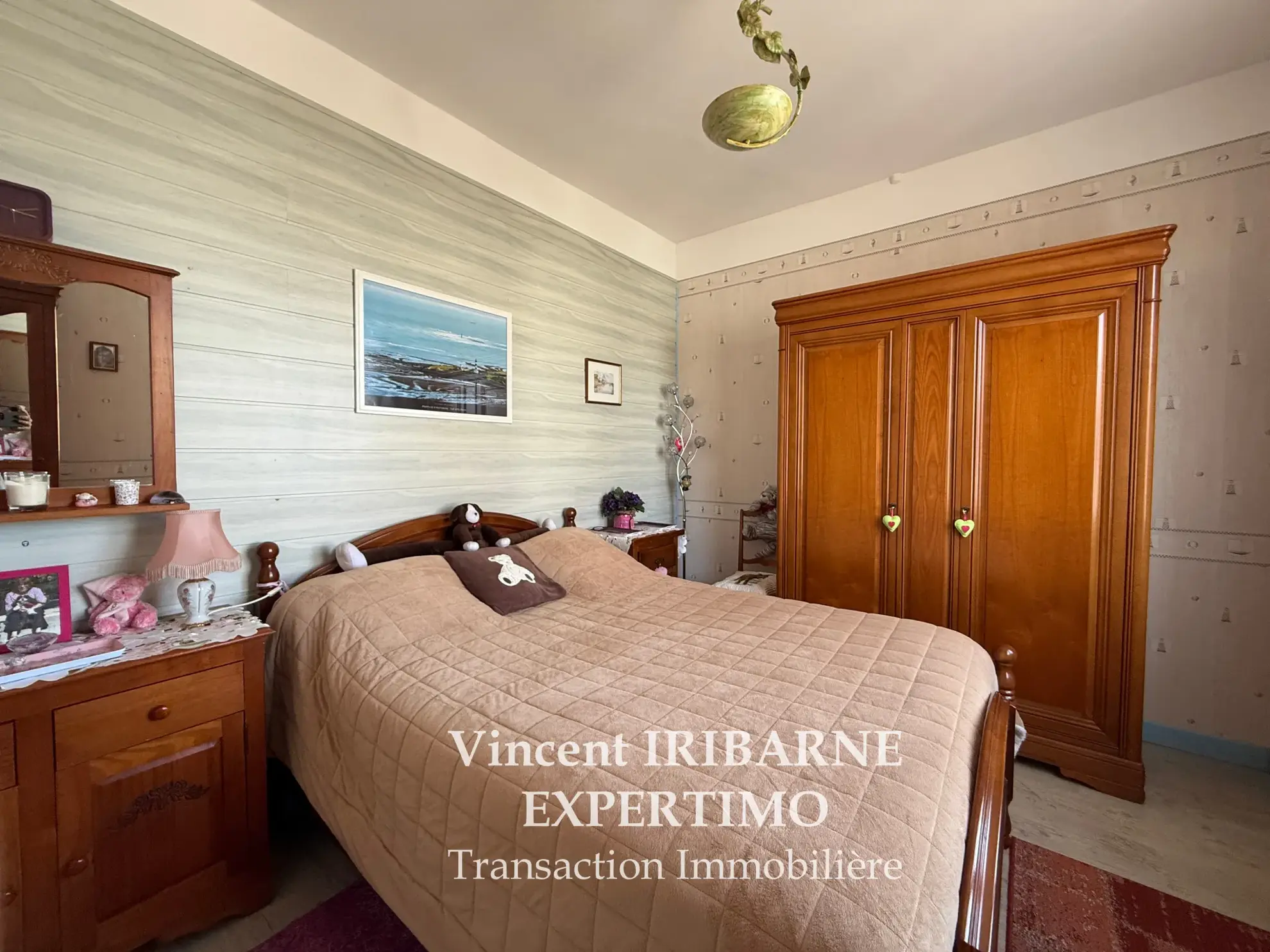 Maison de plain-pied avec jardin et garage à Saintes Rive Gauche 
