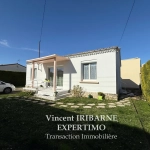 Maison de plain-pied avec jardin et garage à Saintes Rive Gauche