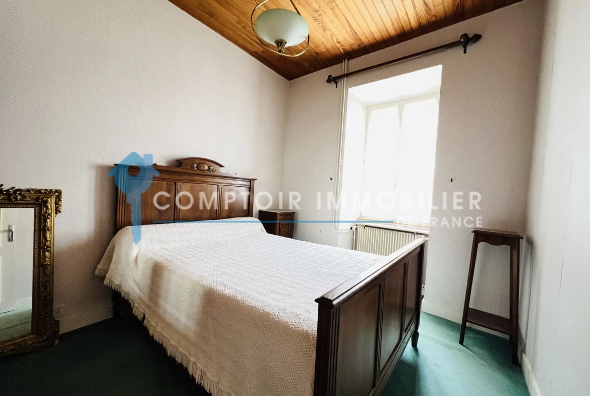Maison en pierres avec dépendances et jardin à Auneau - 111 m² 