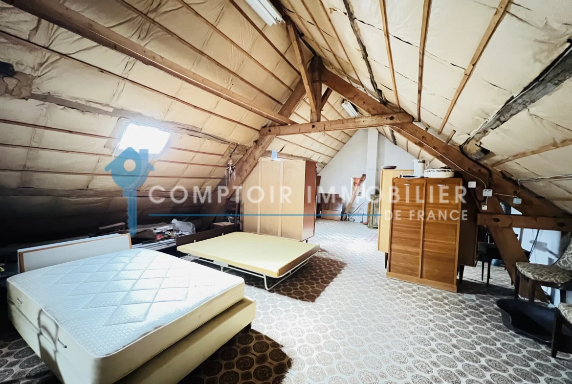 Maison en pierres avec dépendances et jardin à Auneau - 111 m² 