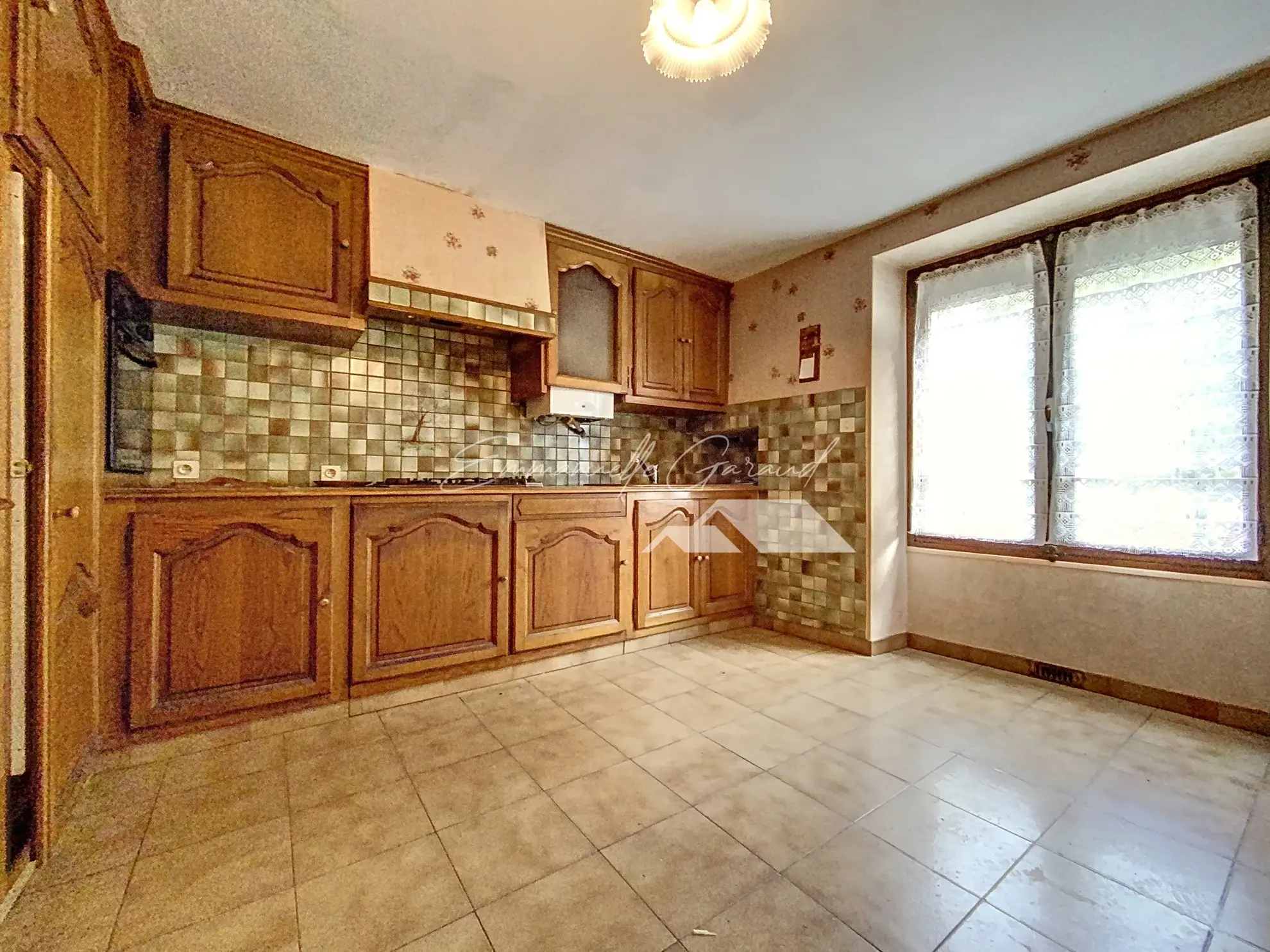 Maison de ville 3 pièces à Millau, cœur de ville avec garage et balcon 