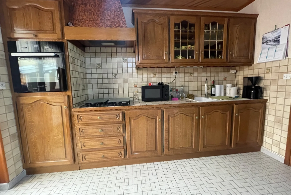 Maison à vendre à Courrières de 110 m² avec jardin et garage à 189 900 euros 