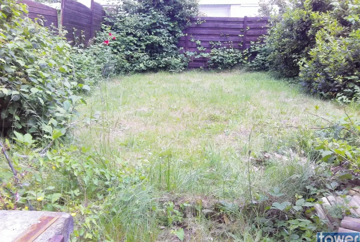 Maison 75 m² à Bethune avec jardin, garage et 3 chambres à proximité du centre-ville 