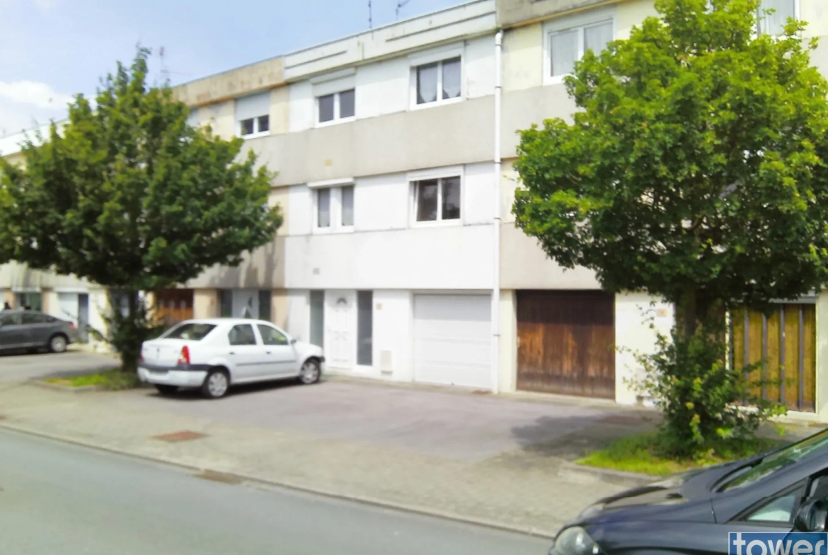Maison 75 m² à Bethune avec jardin, garage et 3 chambres à proximité du centre-ville 